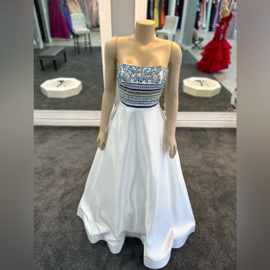 Size 2, 6 & 8. Sold Separately. White Color. Strapless Ballgown